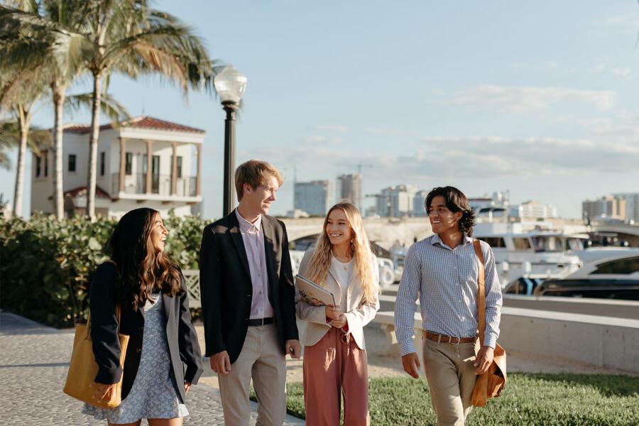 master of business administration mba students walk near the intercoastal waterway in 西<a href='http://vaaghc.wfnintr.net'>推荐全球最大网赌正规平台欢迎您</a>.